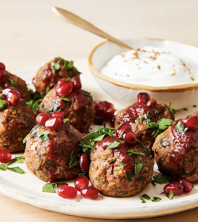 Meatless POM “Meatballs” with Pomegranate Harissa Sauce (served with couscous and roasted delicata squash)