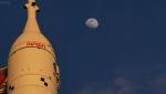 Artemis II heads toward moon after spending a day orbiting Earth