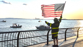 FDNY Honors 9 11 Fallen by Swimming Around Manhattan