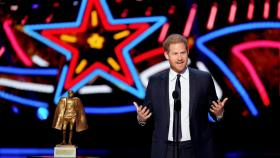 Prince Harry makes surprise appearance as a presenter at NFL Honors event